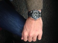 The watch on a fairly medium-sized wrist. Paired with J. Crew herringbone blazer.