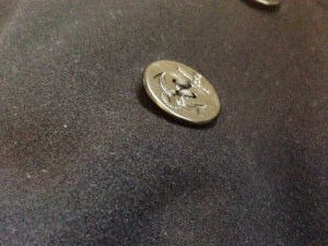 Interesting details on the jacket's front buttons. 