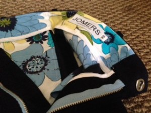 Patterned detailing along the waistband. A similar pattern in the back pockets.