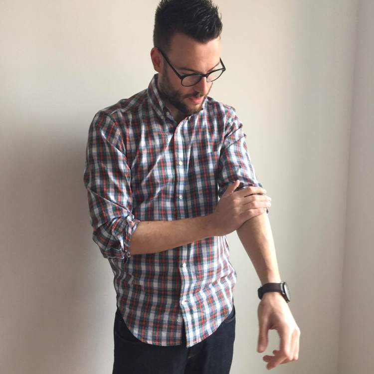 A sturdy shirt with details that reflect the price. Spring Plaid Shirt by Gustin. Dark denim by Mott & Bow. Glasses by Warby Parker. Brown leather watch by Stuhrling. 