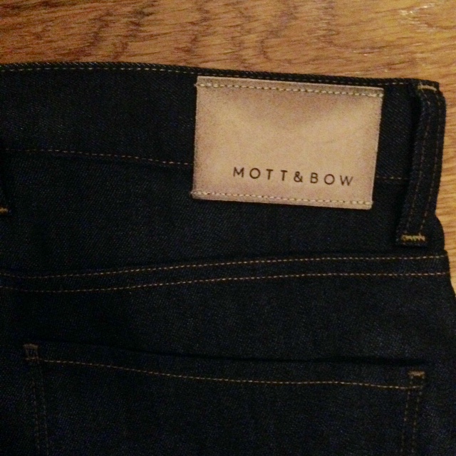 A sturdy leather patch and simple back pocket stitching complete this pair.