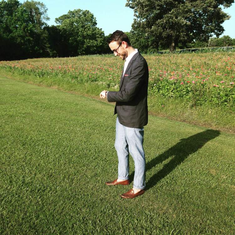 Trying to keep cool and stay stylish. Unconstructed navy blazer by J. Crew.  Vintage red floral pocket square by General Knot. White dress shirt by Combat Gent. Chambray trousers by American Apparel. Brown leather loafers by Bass. Watch by Sturhling. Glasses by Warby Parker.