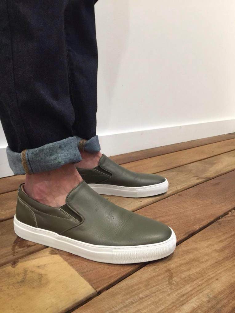 A slim, tapered fit allows this pair of jeans to sit nicely over slip-on sneakers for the summer months. Denim by Mott & Bow. Sneakers by GREATS Brand.