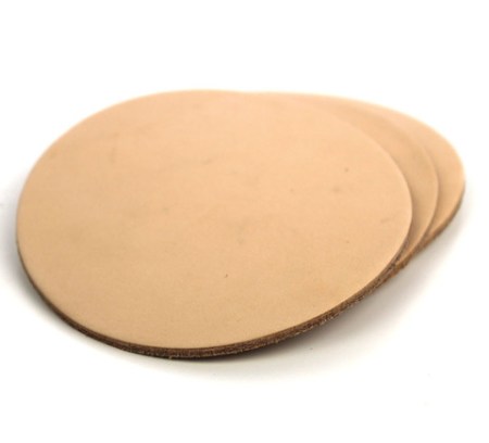 Durable leather makes for a very nice coaster from which to enjoy a hearty adult beverage.