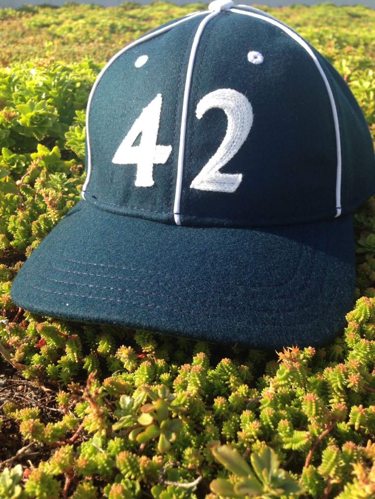 A standout hat style with vintage details makes for a crisp complement to all kinds of outfits.