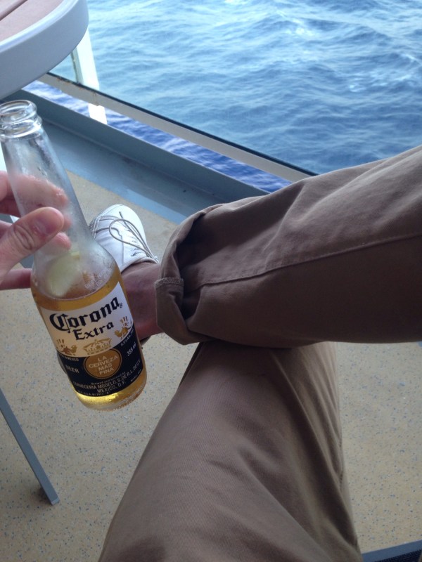 Another way to style these chinos, also from my travels to Italy and Greece. Corona not included. White sneakers by GREATS Brand.
