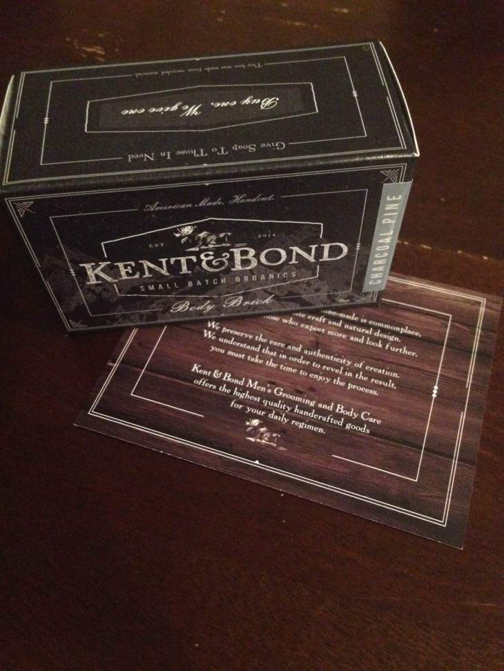 Kent & Bond's Charcoal Pine Body Brick, complete with the brand's mission.