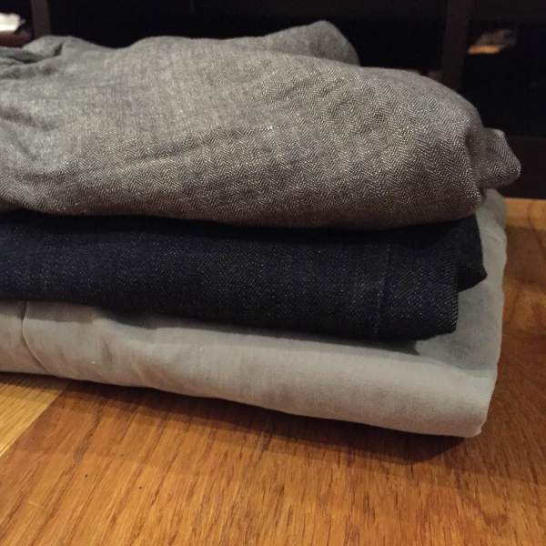 Three options for hot weather, pictured top to bottom -- lightweight JACHS NY grey chinos, flexible Mott & Bow dark denim and lightweight linen shorts from Frank & Oak.