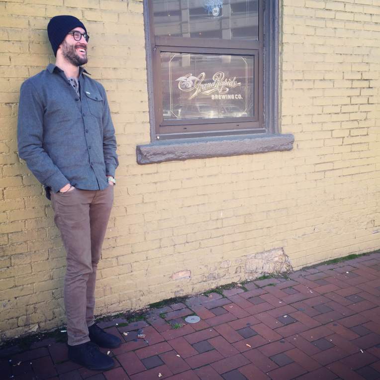 A herringbone workshirt can become a go-to cold weather layer. Workshirt via Reef x H.D. Lee. Slim brown jeans by Bonobos. Navy henley by United By Blue. Merino watch cap by American Trench. Black sneakers by Reef. Glasses by Warby Parker.