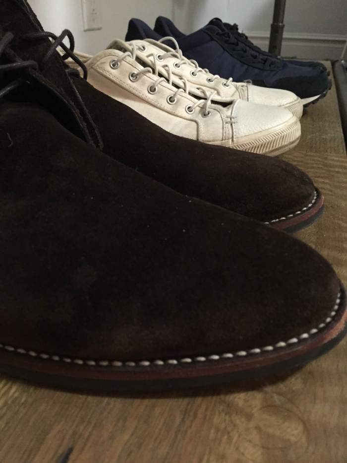 The shoes I'm bringing with me. From front to back: Chocolate Suede Scout Chukka by Thursday Boot Company. White Wilson sneakers and navy Rosen runners from GREATS Brand.