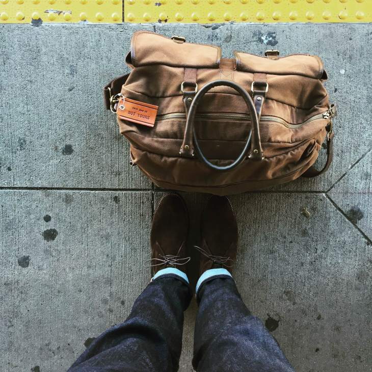 The suede has held up well over time, so there should be plenty more adventures to come. Dark denim by Mott & Bow. Weekender bag by Navali. Leather luggage tag by Owen & Fred.