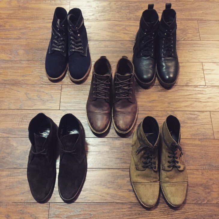Pick a boot, any boot. Back left corner: Wolverine 1000 Mile in Navy Suede. Back right corner: Timberland Britton Hill Waterproof Moc Toe. Center: Timberland West Haven Chukka. Front left: Thursday Boot Company Chocolate Suede Scout Chukka. Front right: Thursday Boot Company Roughout Captain Boot.