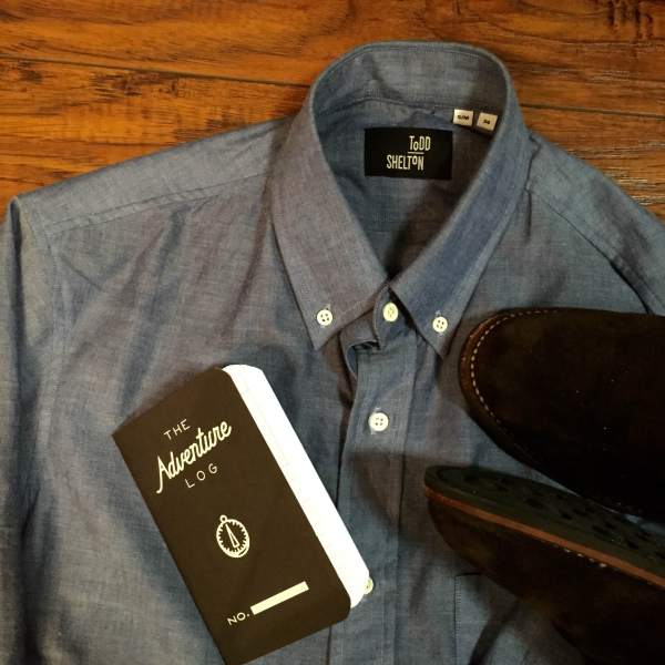 Tried-and-true trip essentials -- a chambray shirt and suede chukka boots. Shirt by Todd Shelton. Chocolate Suede Scout Chukkas by Thursday Boot Company.