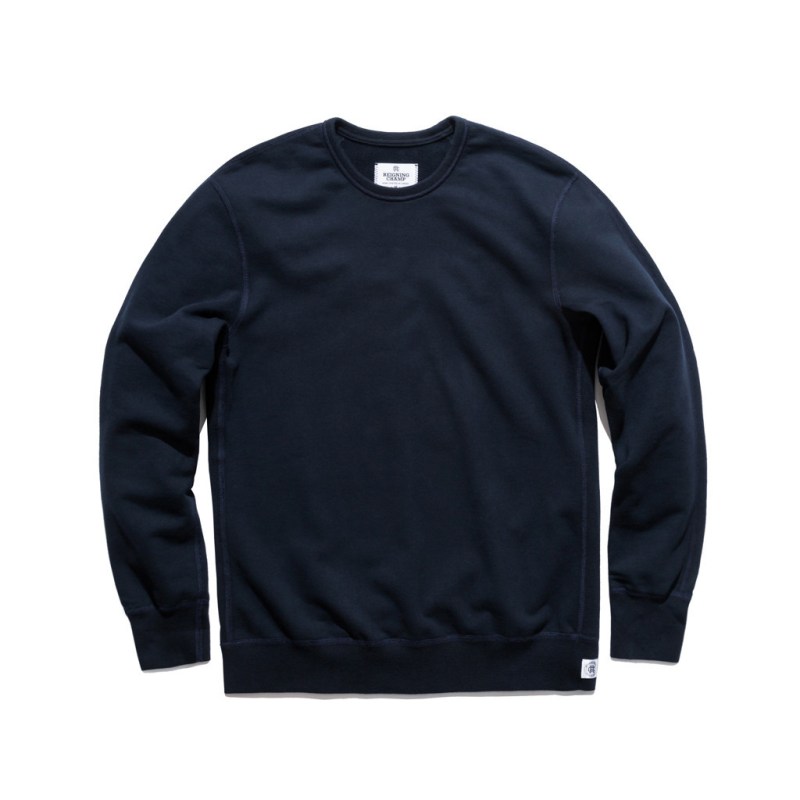 Slim-cut, a classic color and plenty of styling options -- the navy crewneck sweatshirt from Reigning Champ.