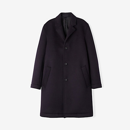 All sorts of weatherproof features found their way into this minimal navy topcoat. Worth the price? 