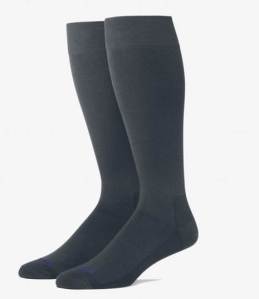 Over-the-calf dress socks -- an underrated style hack that makes a difference.