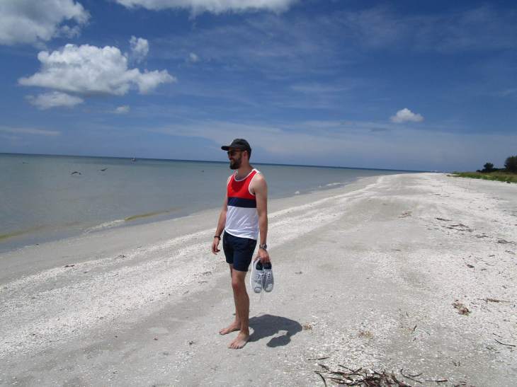 Catching some much-needed Florida rays. Dash Tank by Fourlaps. Swim trunks by JackThreads. Flat Wool Cap by Bridge & Burn. Sunglasses by Nautica. Sneakers from the MW for Reef collab. 8926 Pro Diver by Invicta. Bracelet by Bryer Leather. 