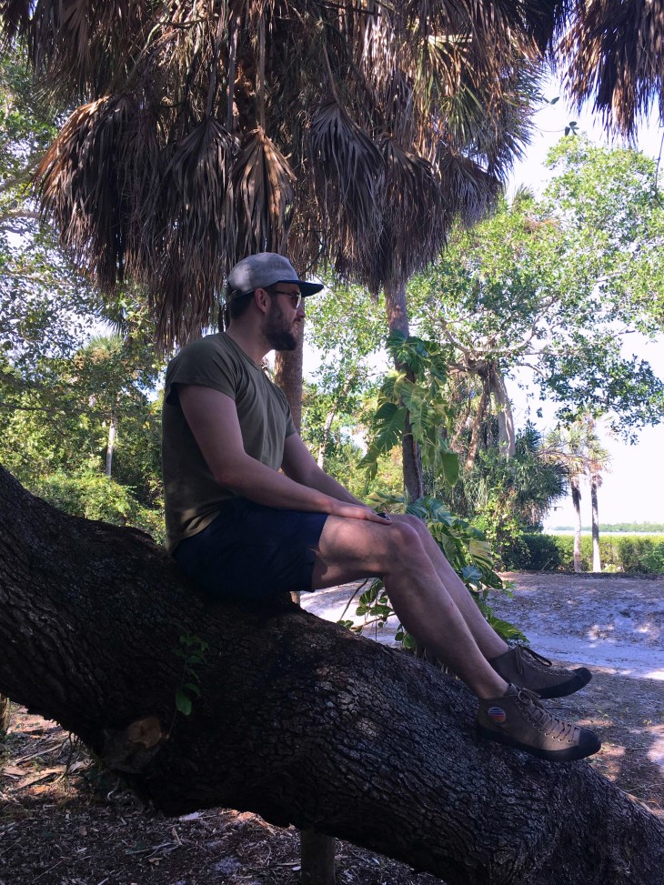 Looking out on a lovely day at Cayo Costa. Brando T-Shirt by Barking Irons. Swim Trunks by JackThreads. Gratton Sneakers by Fronteer. Expedition watch by Timex. Explorer's Cap by Huckberry. Runaway Aviators by MVMT Watches.