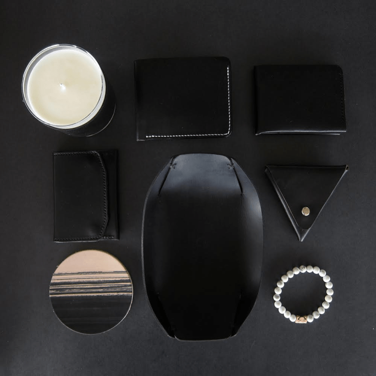 A lineup of items from the brand's very sharp "All-Black" Collection. Photo courtesy of Friday & River. 