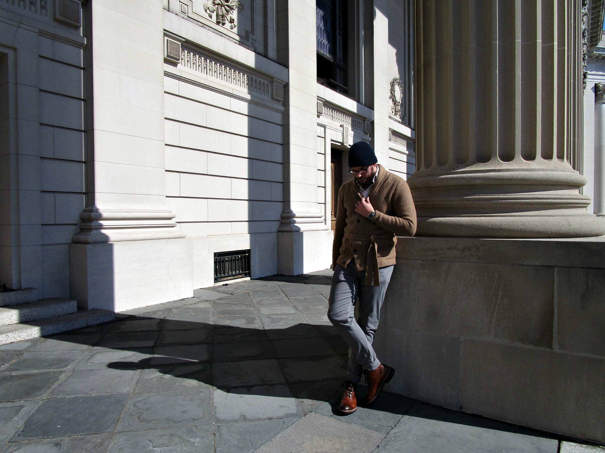 Mixing collegiate, comfortable style for a Sunday of exploration at Beinecke Plaza. Belted Shawl Cardigan by Abercrombie & Fitch. Sashiko Shirt by Taylor Stitch. Stretch twill pants by Kit Culture. Sutter Boots by CAT Footwear. Military Watch by Timex + Todd Snyder. Cashmere cap by Club Monaco. Glasses by Frameri.